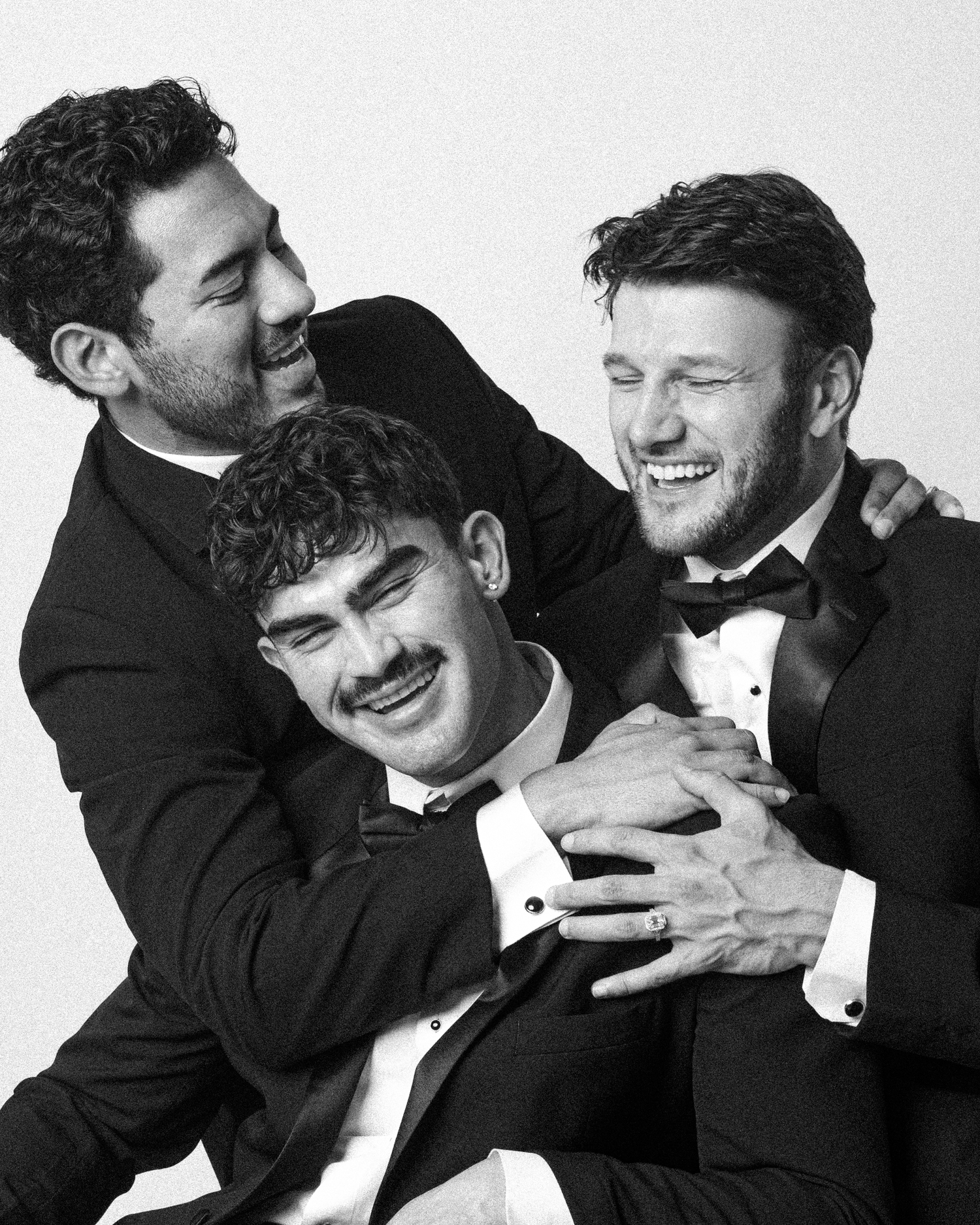 Zachary, Ezequiel, and Gerardo in formal black tie